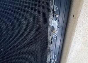 Example of a corroded door with screw based attachment.